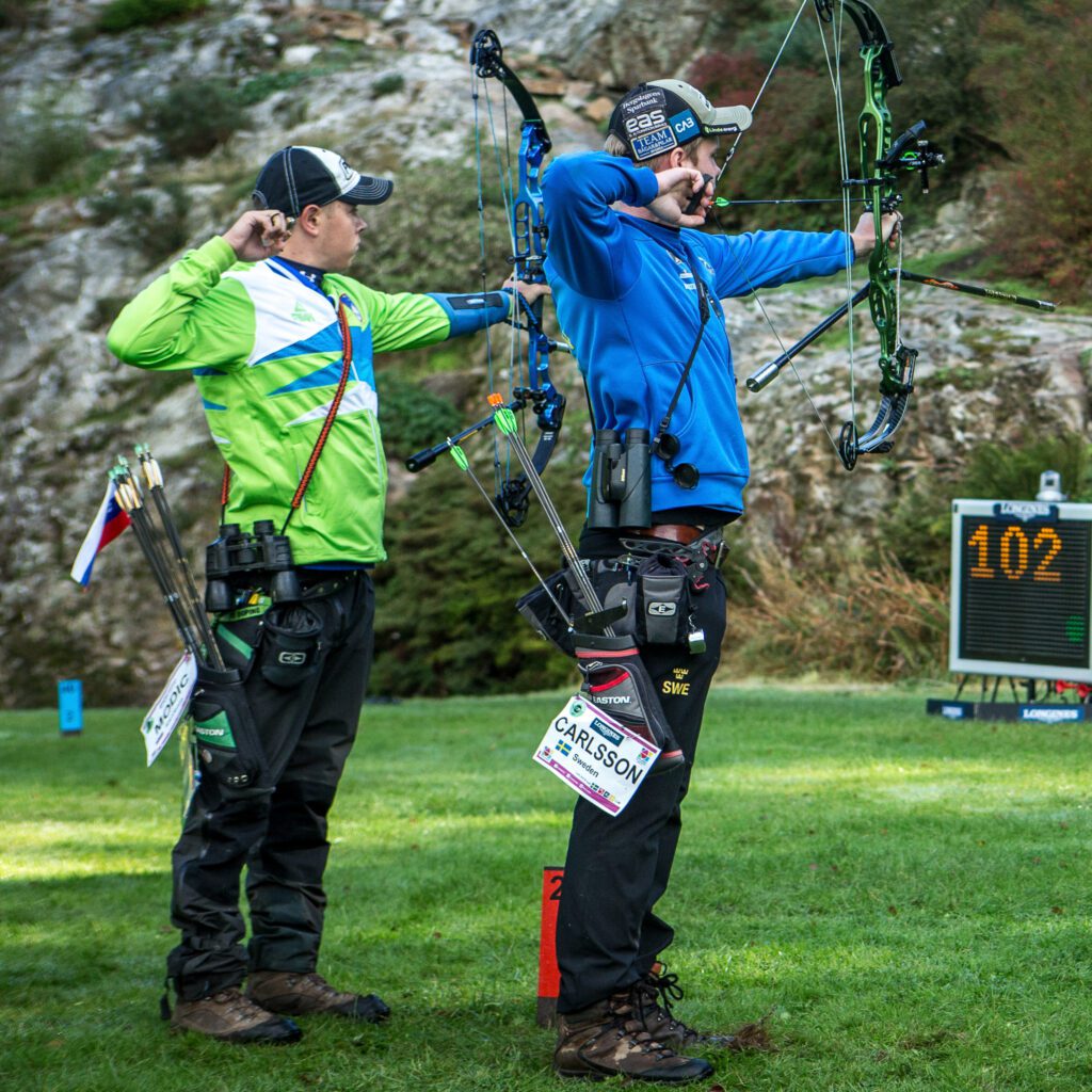 Field competition Archers wearing field quivers